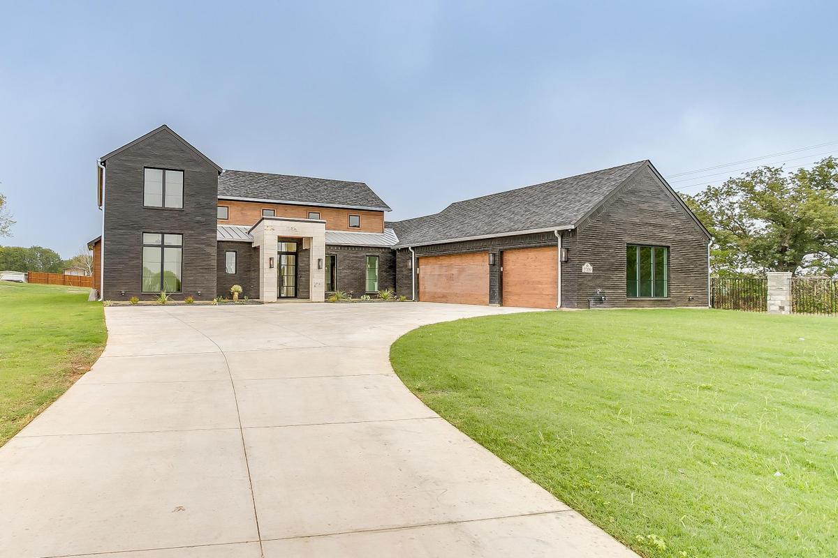Modern custom home exterior built near Mansfield, Texas