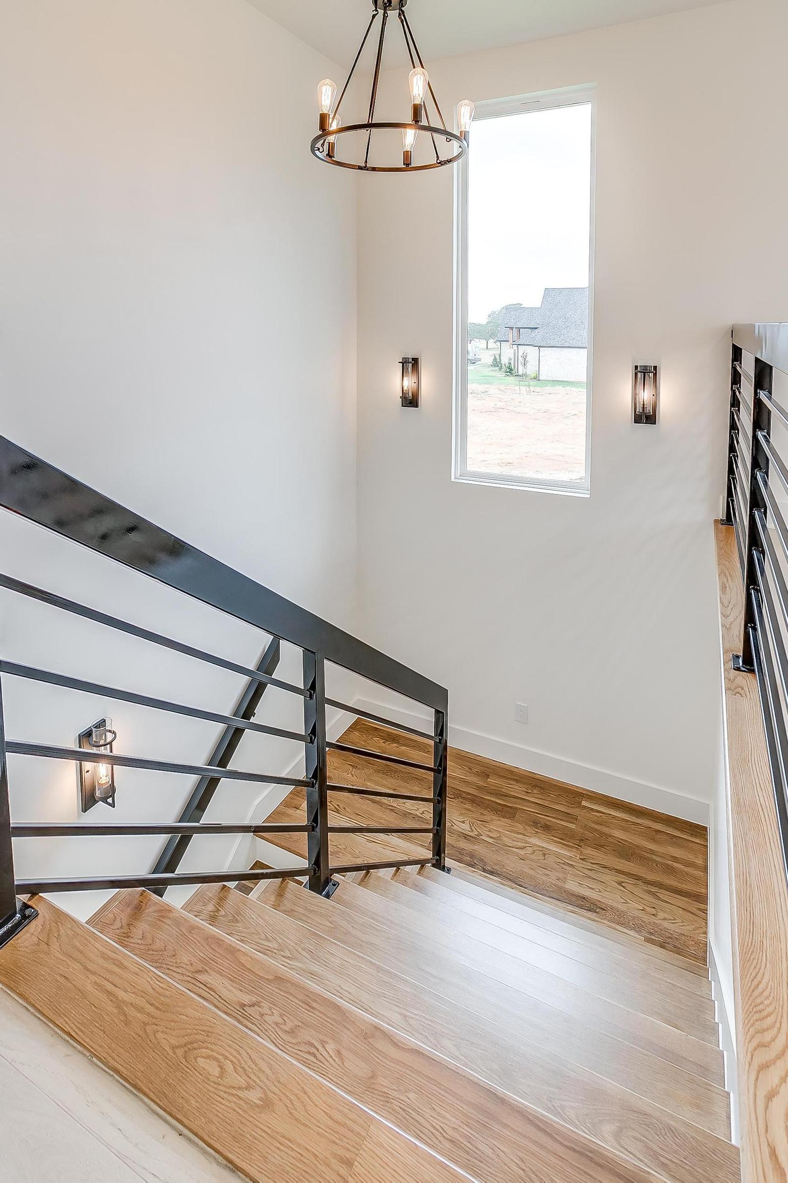 Loft with fireplace in custom home Burleson Texas