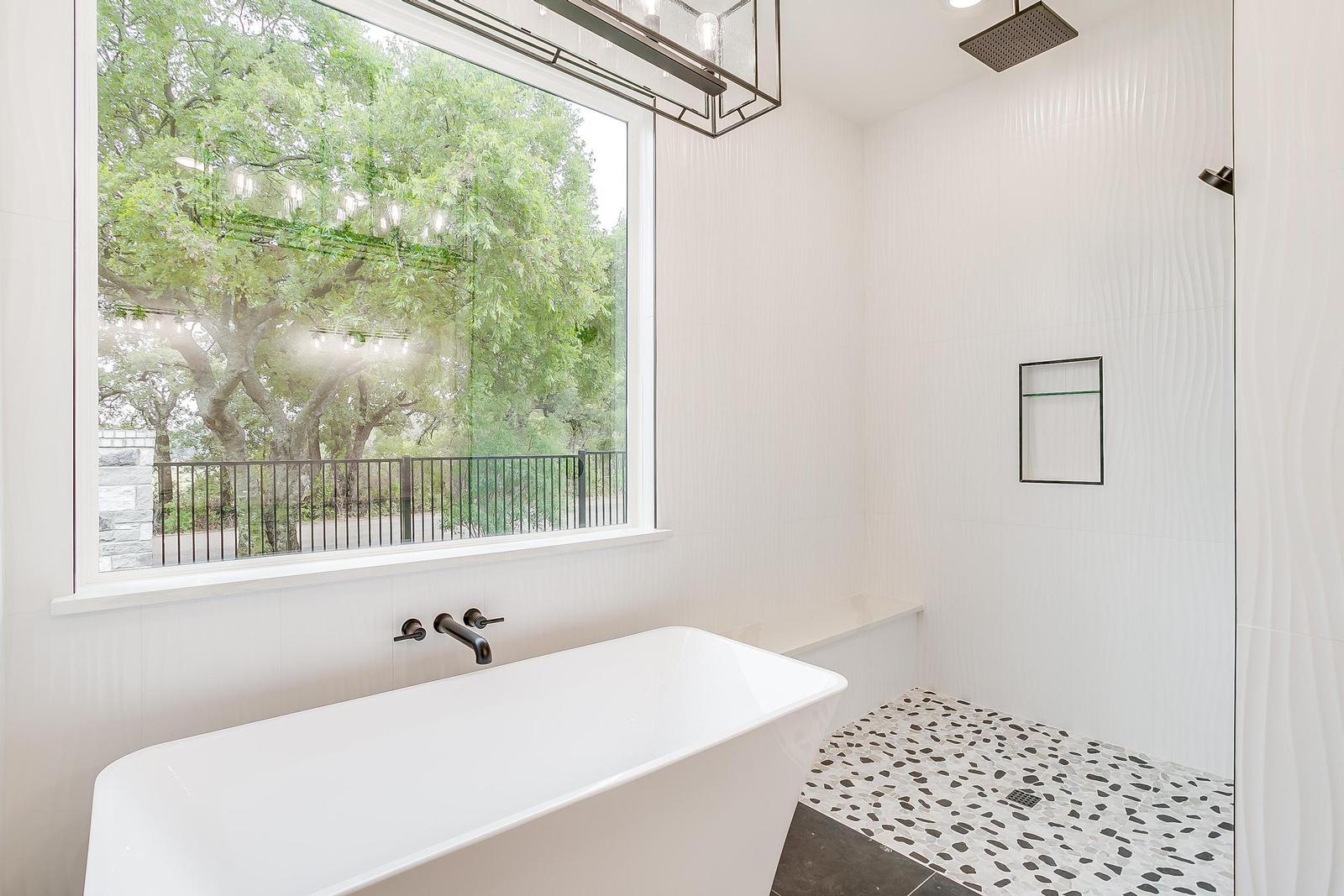 Spa-inspired master bathroom in luxury custom home Burleson Texas